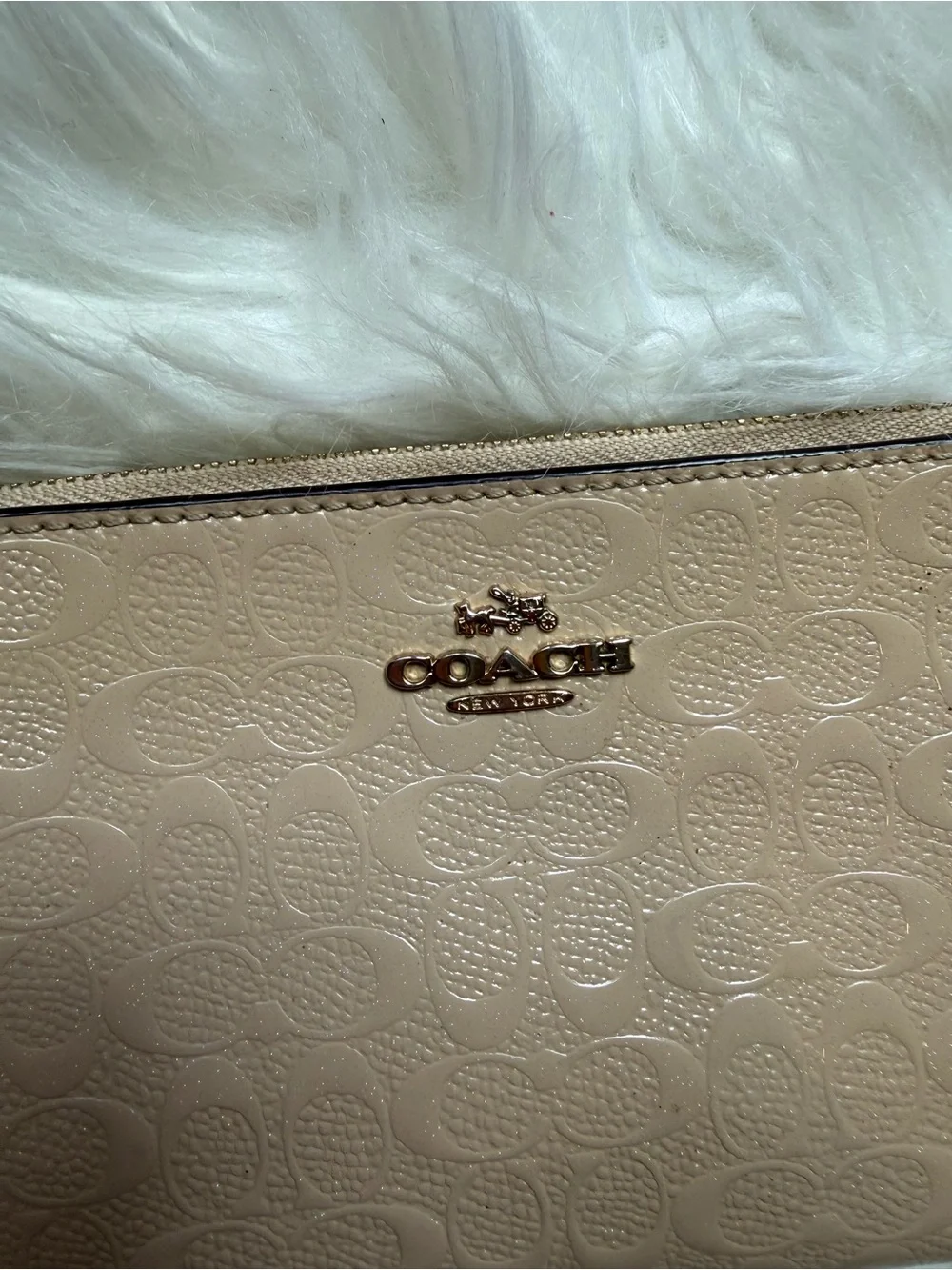 COACH Embossed Signature Wristlet in Neutral Beige